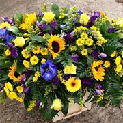 Blue, Purple &amp; Yellow Casket Spray